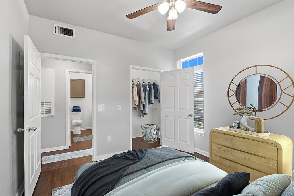Bedroom with ceiling fan at Almeda Park Apartments in Houston TX